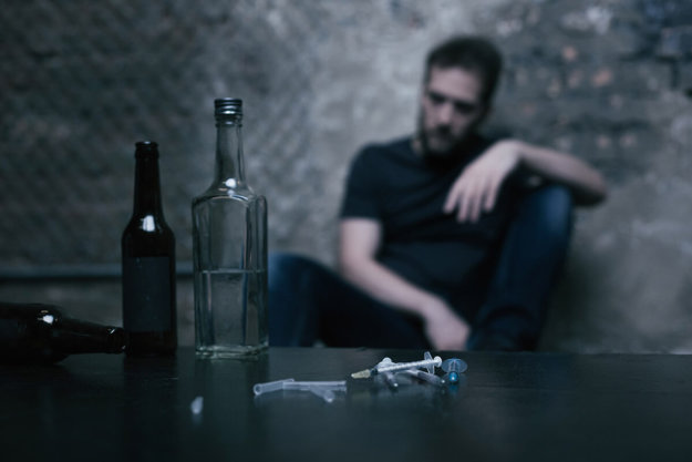 xanax and alcohol overdose symptoms man suffering from Xanax and alcohol overdose symptoms